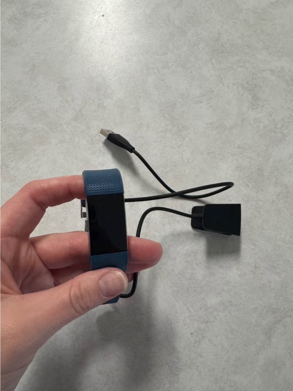 fitbit navy blue fitness tracker with charger